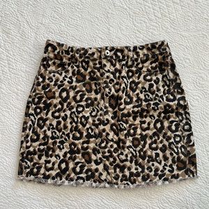 Leopard/cheetah print mini skirt with distressed bottom hem, Umgee USA, size S